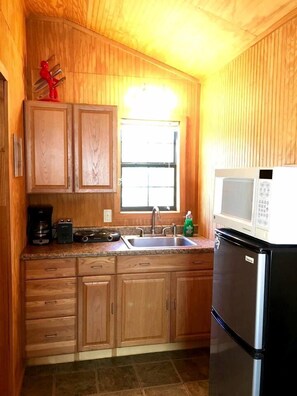 Fridge, microwave, stovetop, coffee/tea maker