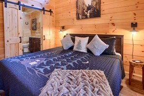 1 bedroom, bed sheets - Romantic Getaways to this Rustic Cabin Rental with Stone Fireplace in Logan, Ohio (Logan)