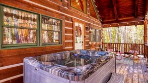 Outdoor spa tub - Romantic Getaways to this Rustic Cabin Rental with Stone Fireplace in Logan, Ohio (Logan)
