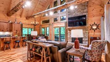 Televisión, chimenea, futbolito y tenis de mesa