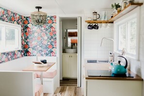 Fridge, stovetop, coffee/tea maker, electric kettle