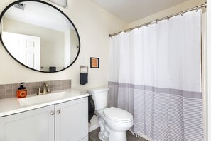 Jetted bath, hair dryer, towels, soap