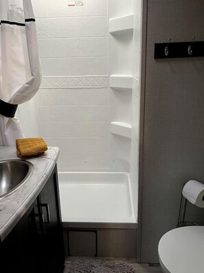 Hair dryer, towels, soap, shampoo