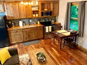 Fridge, microwave, stovetop, coffee/tea maker