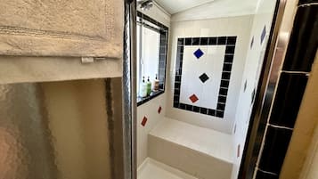 Hair dryer, towels, soap, shampoo