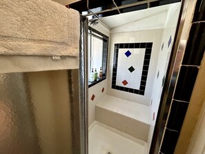 Hair dryer, towels, soap, shampoo