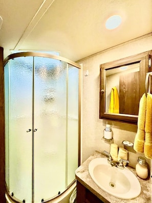 Hair dryer, towels, soap, shampoo