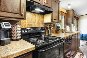Coffee/tea maker, fridge, microwave, oven
