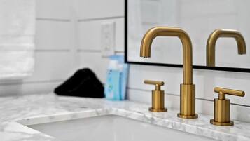 Hair dryer, towels, soap, shampoo