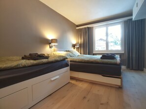 2 habitaciones, wifi gratis y ropa de cama