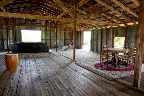 Hobbit Treehouse with Waterfall on the Brazos River for Glamping in Texas