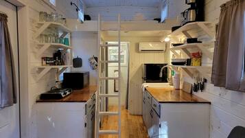 Fridge, coffee/tea maker, cookware/dishes/utensils