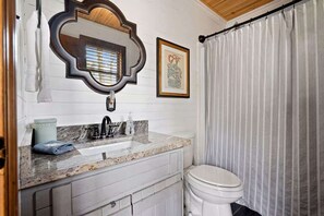 Jetted tub, hair dryer, towels, soap