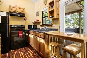 Fridge, stovetop, coffee/tea maker, toaster