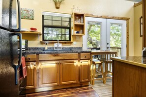 Fridge, stovetop, coffee/tea maker, toaster