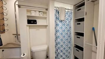 Hair dryer, towels, soap, shampoo