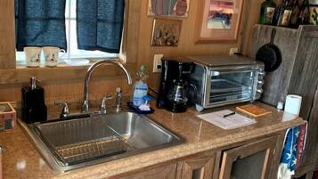 Fridge, microwave, coffee/tea maker, toaster