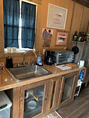 Fridge, microwave, coffee/tea maker, toaster