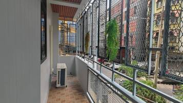 Family Room, Balcony, City View | Terrace/patio