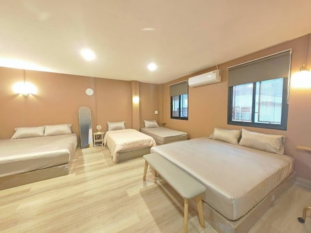 Family Suite, City View | Blackout drapes, iron/ironing board, free WiFi