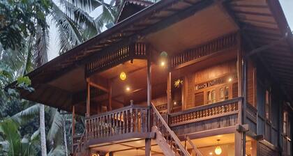 A traditional wooden house far from the rat race in the real Bali.