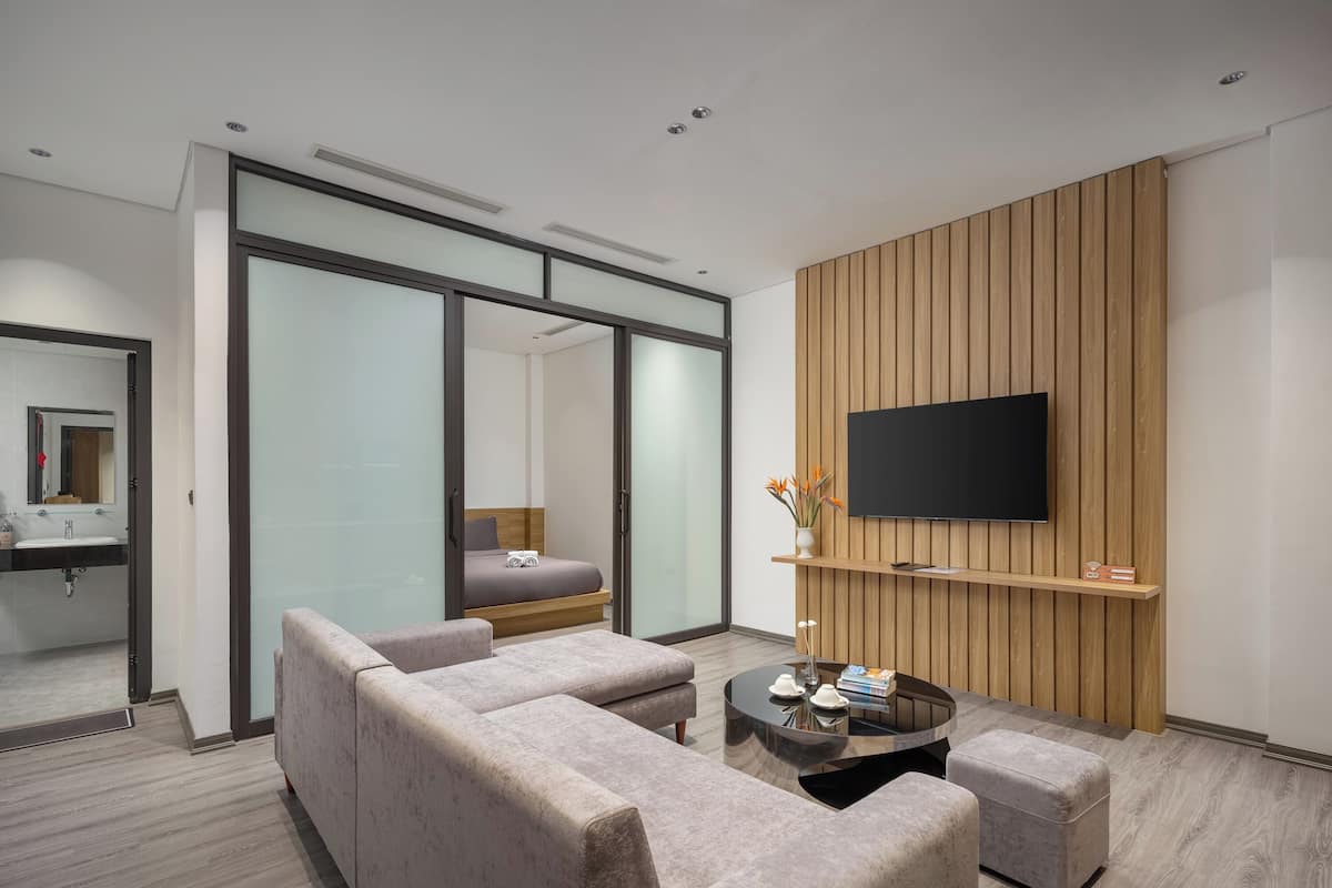Superior Apartment, 2 Bedrooms | Minibar, desk, laptop workspace, iron/ironing board