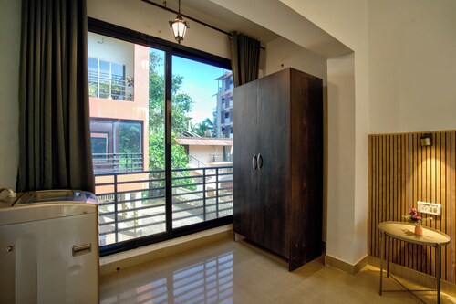 Sun-kissed 1BHK Vagator French Windows.