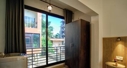 Sun-kissed 1BHK Vagator French Windows.