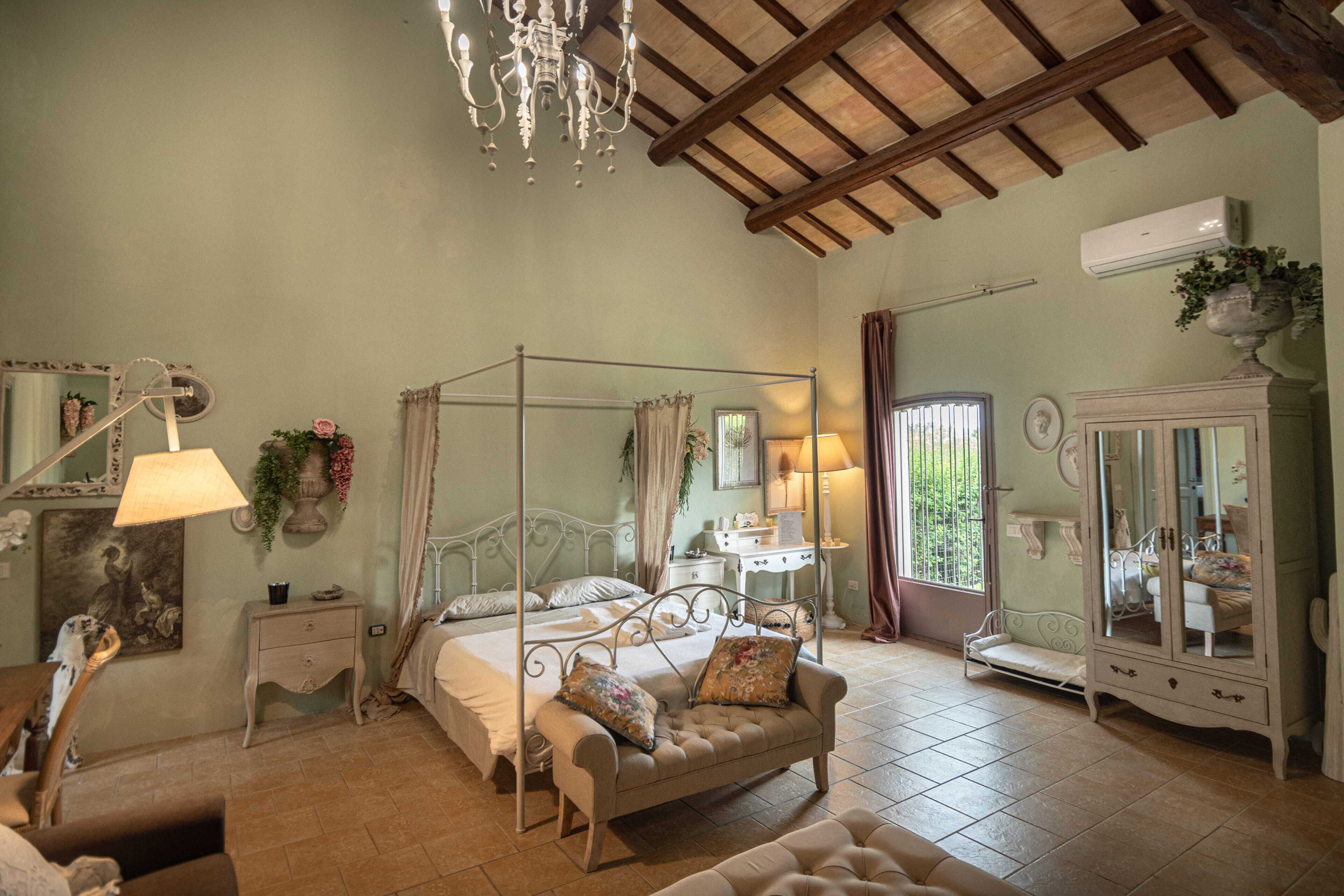 Junior Suite, Patio, Garden View | Down duvets, minibar, individually decorated, individually furnished