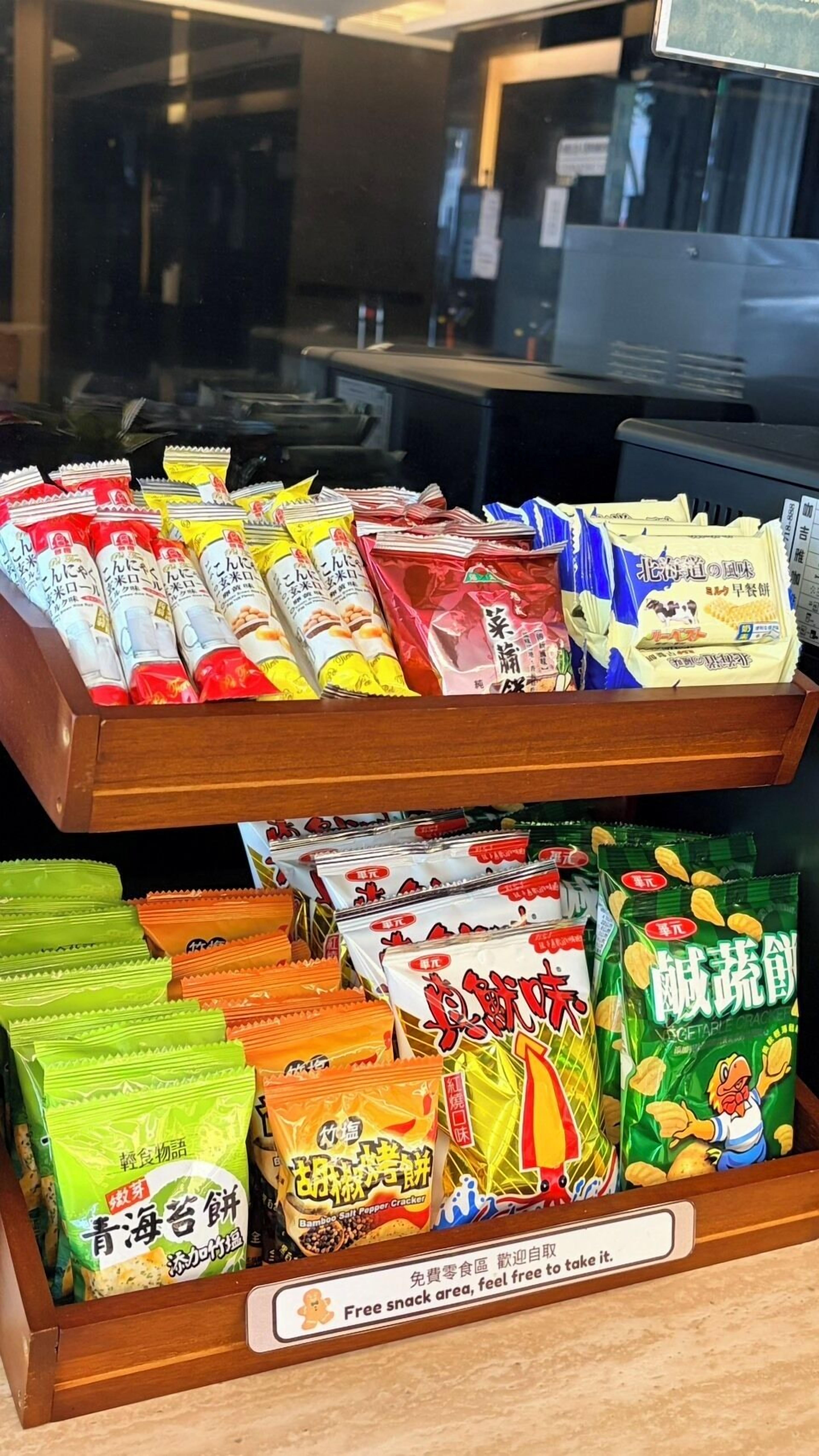 A snack display with various packaged snacks.
