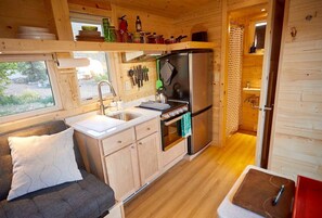 Coffee/tea maker, fridge, oven, stovetop - Rainbow Tiny Home with View & Hot Tub near Hot Springs, El Prado, NM (El Prado)