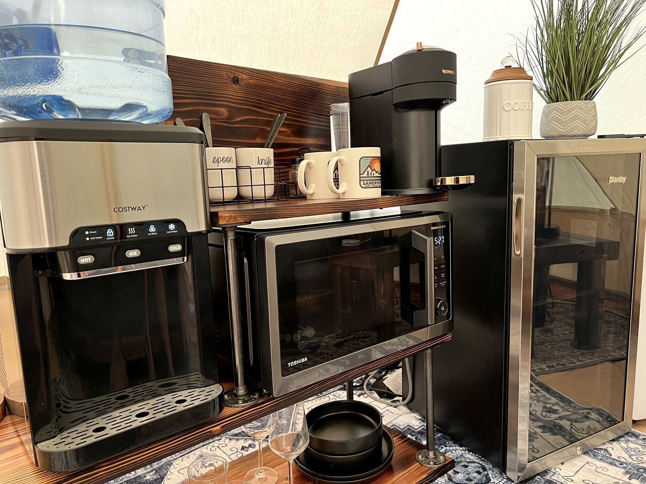 Coffee/tea maker, fridge, oven, cookware/dishes/utensils