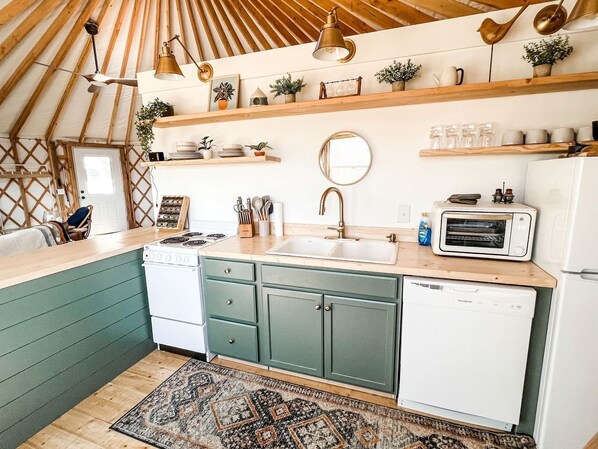 Fridge, microwave, stovetop, coffee/tea maker