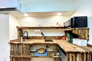 Fridge, stovetop, coffee/tea maker