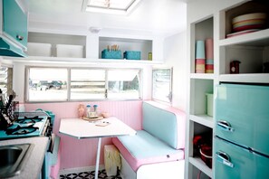 Fridge, stovetop, coffee/tea maker, cookware/dishes/utensils