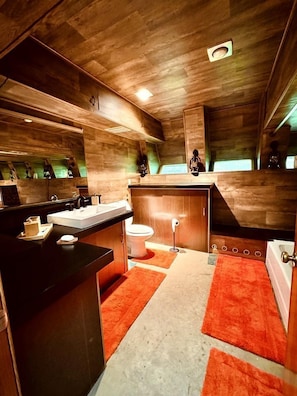 Jetted bath, hair dryer, towels, soap