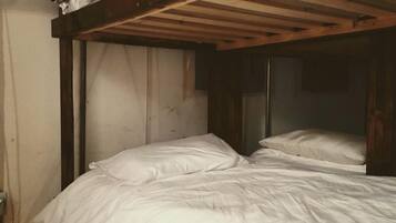 1 bedroom, travel crib, bed sheets