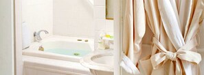 Jetted bath, hair dryer, towels, soap