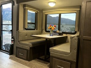 Dining - Spacious Camper on a Llama Rescue Ranch with Stunning Views near Questa, New Mexico (Questa)