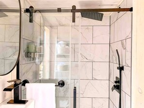 Hair dryer, towels, soap, shampoo