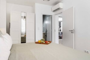 2 عدّة غرف نوم ومكواة/لوح كي وواي فاي مجانًا وملاءات أسرّة