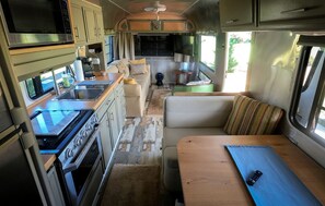 Fridge, stovetop, coffee/tea maker, cookware/dishes/utensils