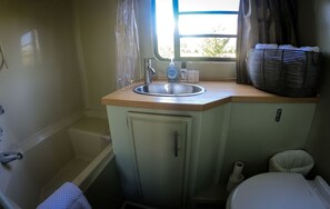 Jetted tub, hair dryer, towels, soap