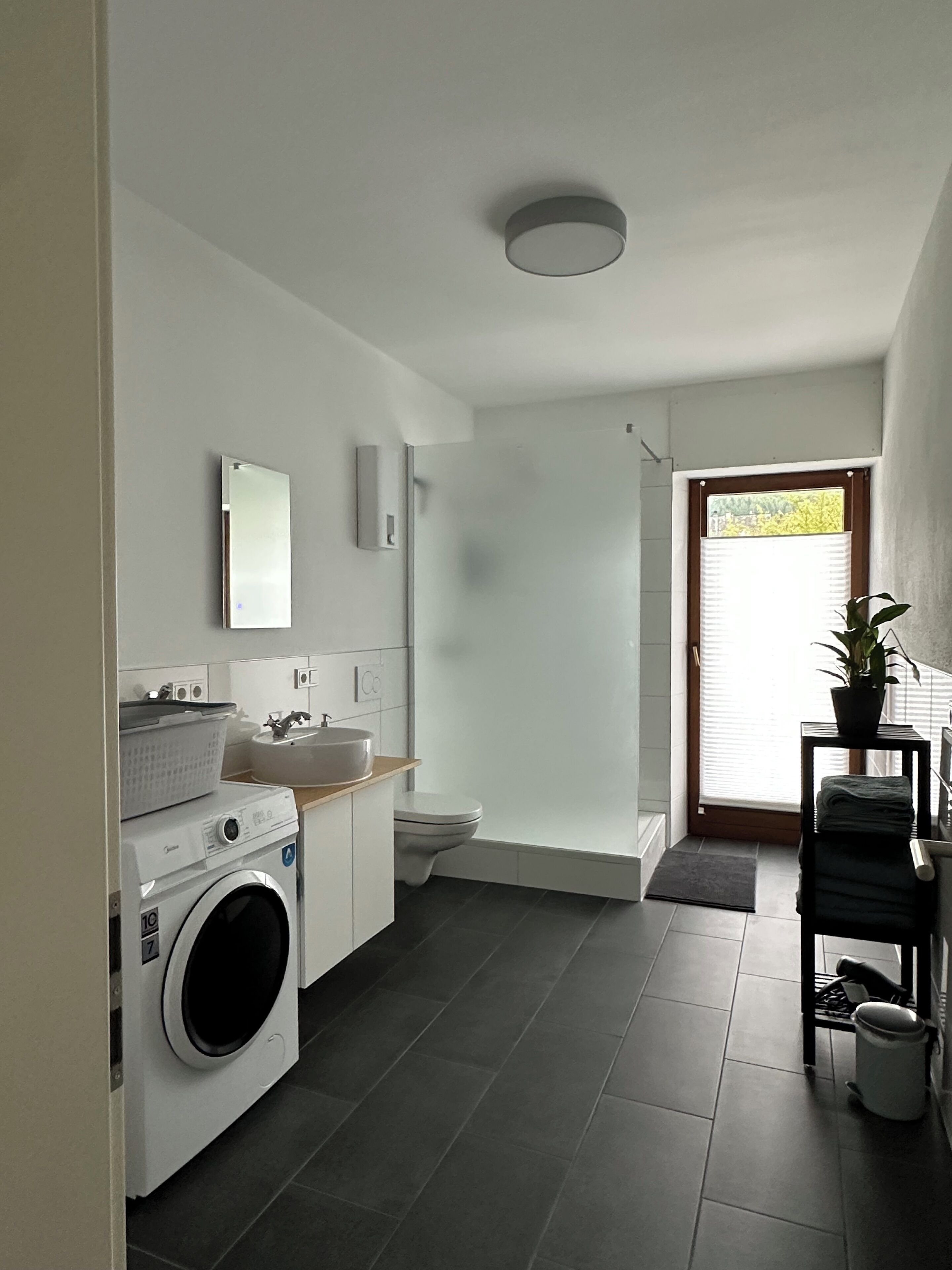 Dutxa, assecador de cabells, tovalloles i sabó 