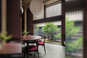Japanese-style House , 3 Bedrooms, Kitchen, Garden View | Living area | 55-inch flat-screen TV with cable channels, heated floors - Asatoyuu Machiya House (Takayama)