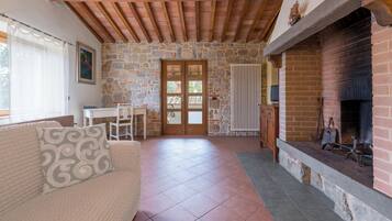 Villa, Patio, Garden View | Living area | 32-inch flat-screen TV with cable channels