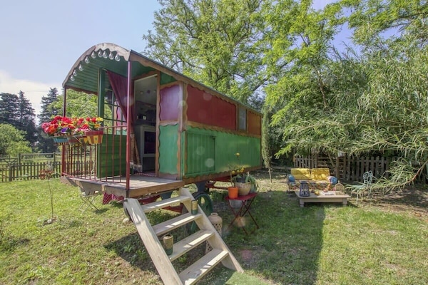 charming caravan nestled in a vast Mediterranean garden