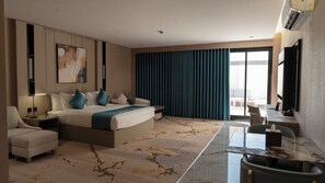 Deluxe Studio Suite, 1 King Bed | Living area | 55-inch Smart TV with satellite channels, offices - Rosa Grand Hotel Granada (Riyadh)