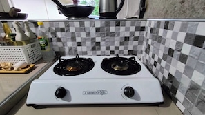 Fridge, microwave, cookware/dishes/utensils