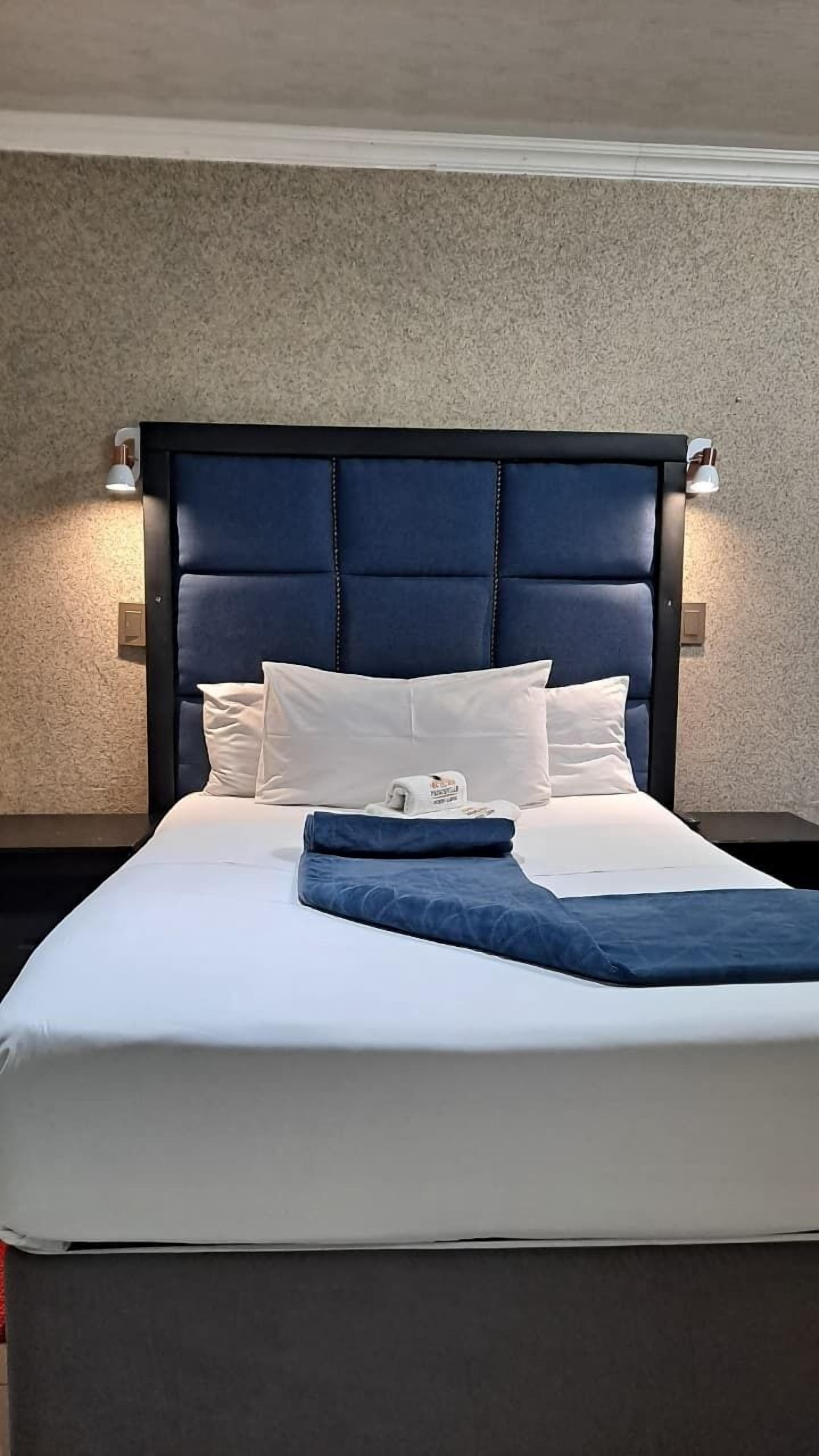 Executive Room | Iron/ironing board, free WiFi